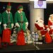 Left to right: Jonah Tong, Nolan McLean, Brandon Sproat dress as elves and Clay Holmes as Santa with his wife, Ashlyn as Mrs. Claus, prepare to give gifts away to the children during the Mets Annual Kids Holiday Party on Dec. 18, 2025 at Citi Field.