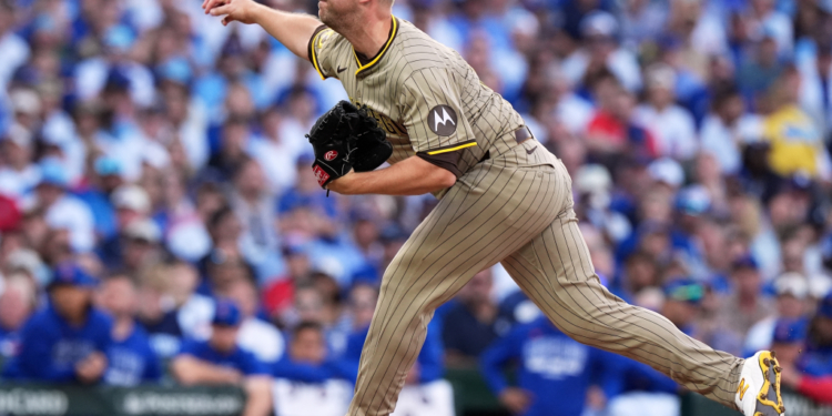 San Diego Padres' Michael King throws during the fourth inning of Game 3 of a National League wild card baseball game against the Chicago Cubs Thursday, Oct. 2, 2025, in Chicago.