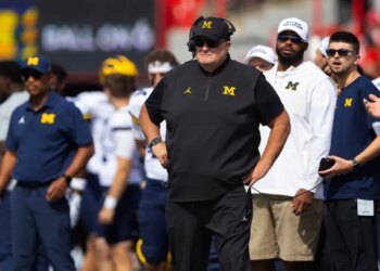 Michigan acting head coach Biff Poggi watches as his team plays against Nebraska during the first half of an NCAA college football game Saturday, Sept. 20, 2025, in Lincoln, Neb.