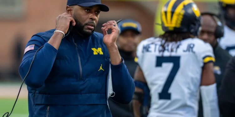 Michigan Wolverines head coach Sherrone Moore on the sidelines during the first quarter against the Maryland Terrapins at SECU Stadium.