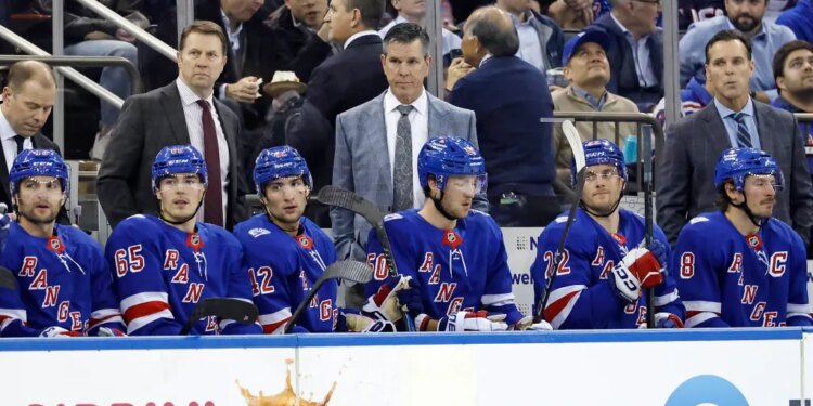 New York Rangers head coach Mike Sullivan reacting on the bench in the first period.