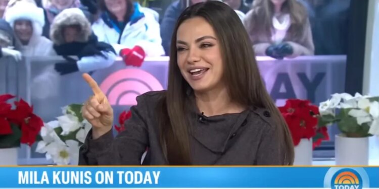 Mila Kunis on TODAY show, pointing and smiling.