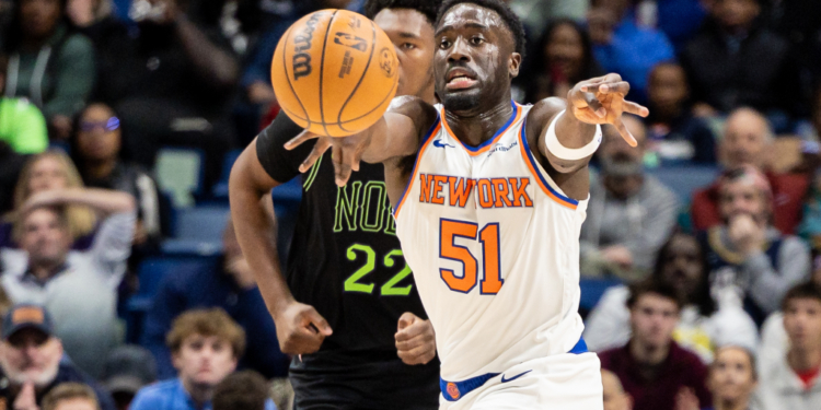 Knicks forward Mohamed Diawara (51) passes the ball against New Orleans Pelicans center Derik Queen (22) during the first half at Smoothie King Center.