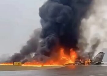 A private jet crashed and burst into flames on a runway.