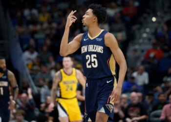 New Orleans Pelicans forward Trey Murphy III reacting after making a basket.