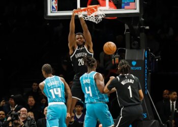 Brooklyn Nets center Day'Ron Sharpe (20) dunks during the game against the Charlotte Hornets.