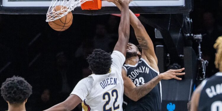Nic Claxton slams home a dunk past Derik Queen during the Nets' 119-101 blowout win over the Pelicans on Dec. 6, 2025 at Barclays Center.
