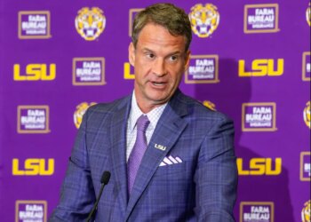 LSU's new head football coach Lane Kiffin giving an opening statement at an introductory news conference.