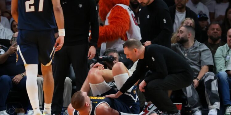 Jokic Injury knee Miami Heat