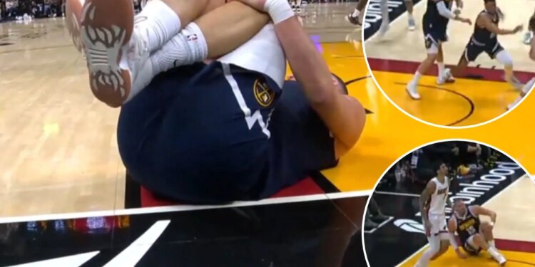 Nuggets' Nikola Jokic crumbles to ground with knee injury