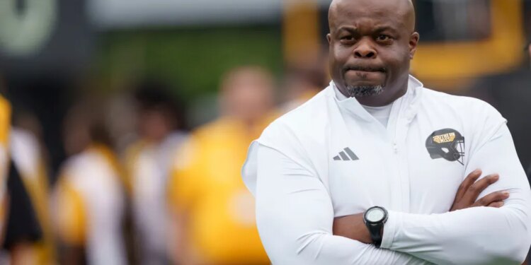 Southern Mississippi head coach Charles Huff watches his team.