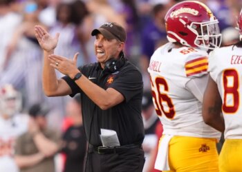 Iowa State head coach Matt Campbell yelling on the sidelines during a game.