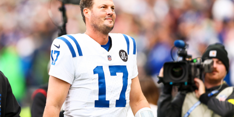 Indianapolis Colts quarterback Philip Rivers walks to the locker room.