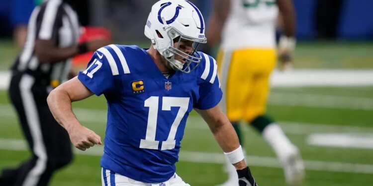 Indianapolis Colts quarterback Philip Rivers (17) reacts after throwing a touchdown pass.