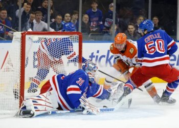 Anaheim Ducks defenseman Jackson Lacombe (2) scores a goal past New York Rangers goaltender Igor Shesterkin (31) off a rebound during the second period.