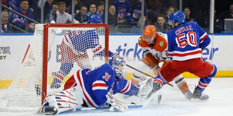 Anaheim Ducks defenseman Jackson Lacombe (2) scores a goal past New York Rangers goaltender Igor Shesterkin (31) off a rebound during the second period.