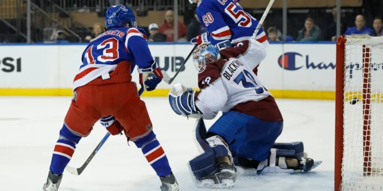 New York Rangers left wing Artemi Panarin scores a goal in the third period.