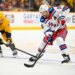 New York Rangers center Vincent Trocheck (16) skates with the puck against the Nashville Predators.