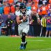 Jacksonville Jaguars quarterback Trevor Lawrence runs for a touchdown against the Denver Broncos.