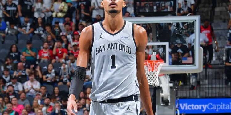 An image collage containing 1 images, Image 1 shows Victor Wembanyama #1 of the San Antonio Spurs