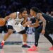 Brooklyn Nets guard Cam Thomas (24) handles the ball while Minnesota Timberwolves guard Rob Dillingham defends.