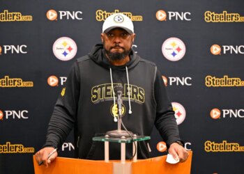 Head coach Mike Tomlin of the Pittsburgh Steelers speaking at a news conference.