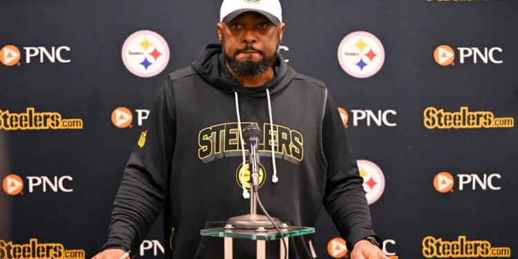 Head coach Mike Tomlin of the Pittsburgh Steelers speaking at a news conference.