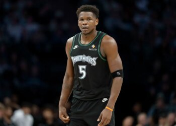 Minnesota Timberwolves guard Anthony Edwards (5) looks on against the New York Knicks.