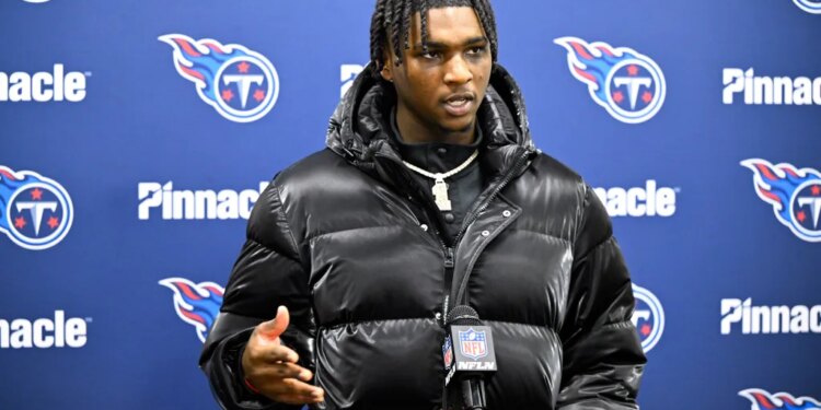 Tennessee Titans quarterback Cam Ward responds to a question during a news conference.