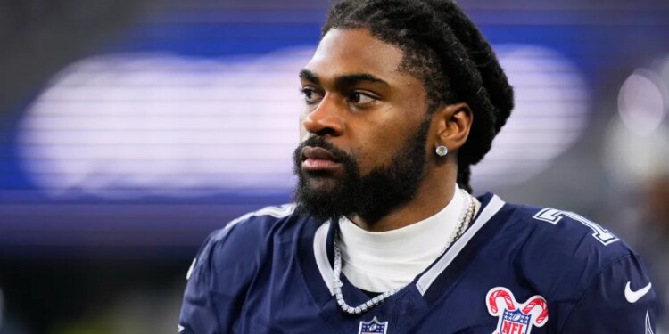 Dallas Cowboys cornerback Trevon Diggs (7) walks along the sideline during an NFL football game.