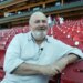 Actor and film director Rob Reiner waits for an interview before the Los Angeles Angels and St. Louis Cardinals game at Busch Stadium in St. Louis on June 8, 2007.