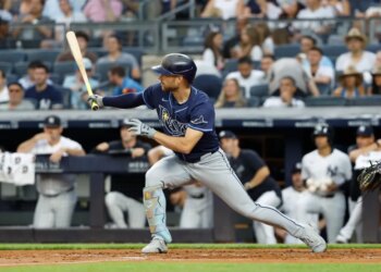 Tampa Bay Rays' Brandon Lowe hits an RBI double against the Yankees.
