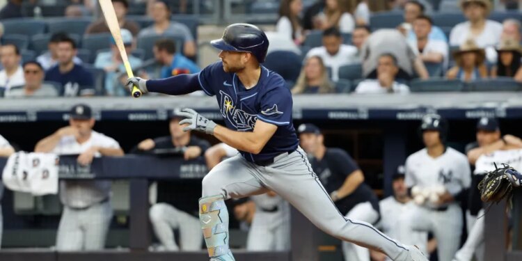 Tampa Bay Rays' Brandon Lowe hits an RBI double against the Yankees.