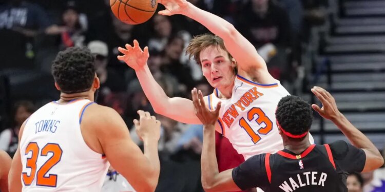 Tyler Kolek makes a pass to Karl-Anthony Towns during the Knicks' 117-101 road win over the Raptors in the quarterfinals of the NBA Cup on Dec. 9, 2025.