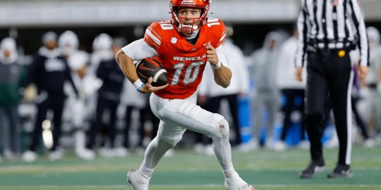UNLV quarterback Anthony Colandrea (10) runs for a touchdown.