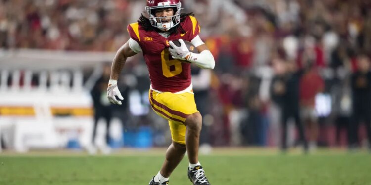 Southern California wide receiver Makai Lemon runs with the ball during the first half of an NCAA college football game against UCLA, Saturday, Nov. 29, 2025, in Los Angeles.