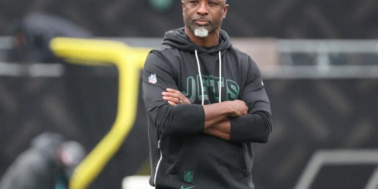 Aaron Glenn looks on during the Jets-Dolphins game on Dec. 7, 2025.