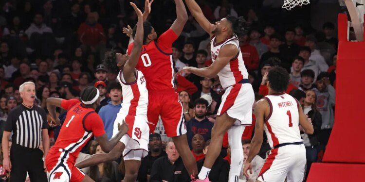 Zuby Ejiofor rejects Malik Dia's shot for one of his eight blocks during St. John's 63-58 win over Ole Miss on Dec. 6, 2025 at the Garden.