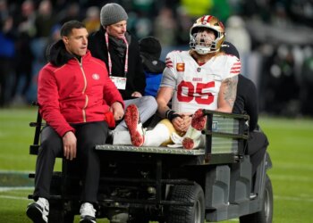 San Francisco 49ers tight end George Kittle is carted off the field after an injury during a playoff football game.