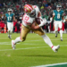 San Francisco 49ers running back Christian McCaffrey scoring a touchdown against the Philadelphia Eagles.