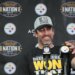 Pittsburgh Steelers quarterback Aaron Rodgers smiles while speaking during a news conference.