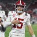 Alabama quarterback Ty Simpson (15) celebrates winning after the first round of an NCAA College Football Playoff against Oklahoma, Friday, Dec. 19, 2025, in Norman, Okla.