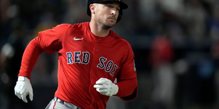 A baseball player wearing a red "Red Sox" jersey, a batting helmet, and white gloves, looking towards the right while running.