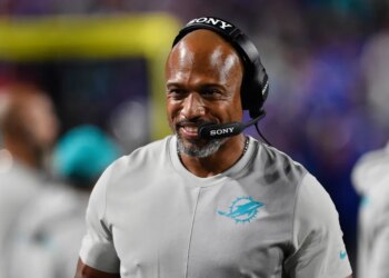 Miami Dolphins defensive coordinator Anthony Weaver walks on the sideline during the second half of an NFL football game against the Buffalo Bills, Thursday, Sept. 18, 2025, in Orchard Park, N.Y.