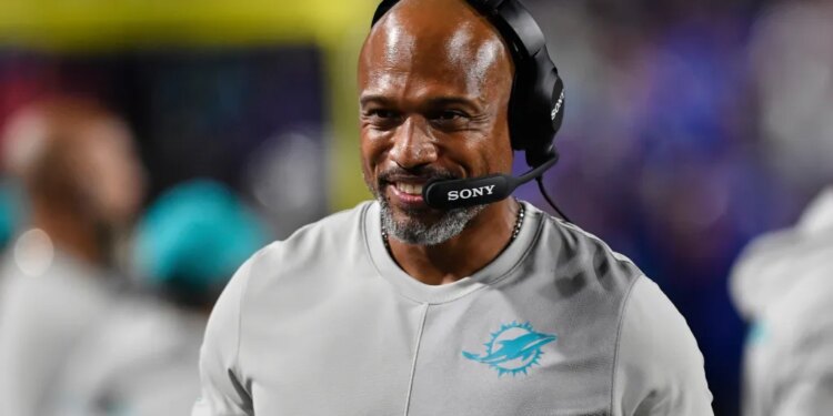 Miami Dolphins defensive coordinator Anthony Weaver walks on the sideline during the second half of an NFL football game against the Buffalo Bills, Thursday, Sept. 18, 2025, in Orchard Park, N.Y.