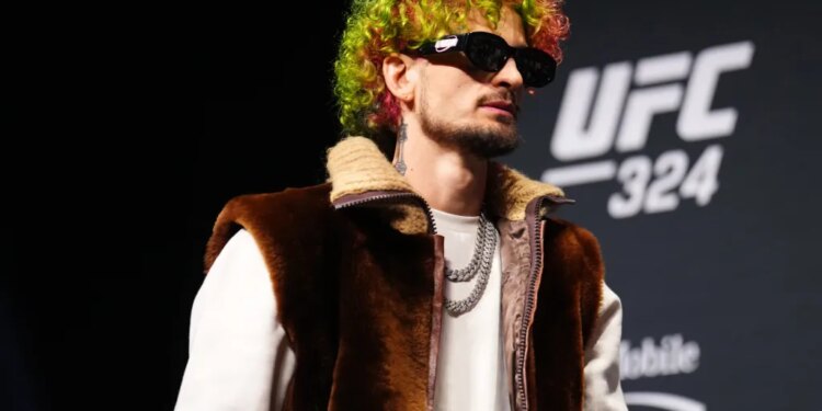 Sean O'Malley on stage at the UFC 324 press conference.
