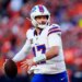 Buffalo Bills quarterback Josh Allen (17) rolls out during a game against the Denver Broncos.