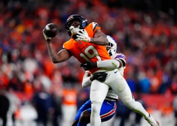 Bills cornerback Tre'davious White (27) is called for a pass interference on Broncos wide receiver Marvin Mims Jr. (19) during overtime on Jan. 17, 2026.