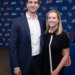 David Stearns, the new President of Baseball Operations for the New York Mets, poses with his wife, Whitney, at a press conference.