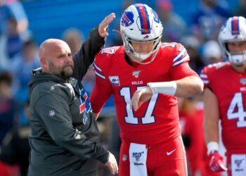 Buffalo Bills offensive coordinator Brian Daboll, left, encourages quarterback Josh Allen as he warms up before an NFL football game Miami Dolphins, Sunday, Oct. 20, 2019, in Orchard Park, N.Y.